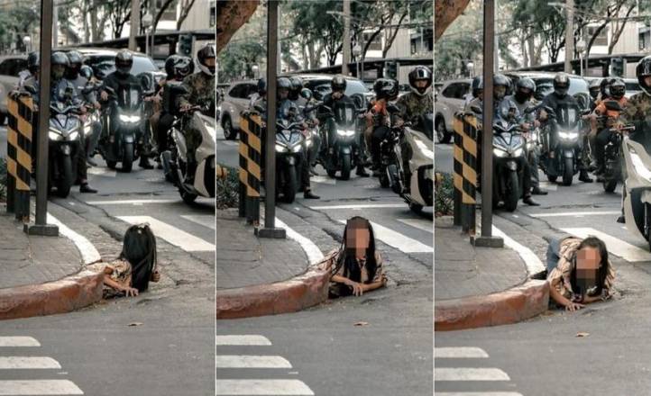 皇冠信用网怎么弄_女子从菲律宾闹市排水道爬出皇冠信用网怎么弄，画面惊悚像恐怖电影